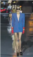  ?? EPA ?? Tuxedo dresses with bright gloves at Saint Laurent