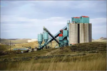  ?? MEAD GRUVER — THE ASSOCIATED PRESS ?? In this Friday photo shows the Eagle Butte mine just north of Gillette, Wyo. The shutdown of Blackjewel LLC’s Belle Ayr and Eagle Butte mines in Wyoming since has added yet more uncertaint­y to the Powder River Basin’s struggling coal economy.