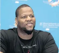  ?? WILFREDO LEE/AP ?? Defensive tackle Ndamukong Suh talks with the media on Tuesday after the first day of organized team activities football practice.