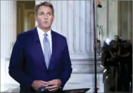  ?? ASSOCIATED PRESS ?? Sen. Jeff Flake, R-Ariz., announced Tuesday he would not run for re-election in 2018, condemning in a speech aimed at President Donald Trump the “flagrant disregard of truth and decency” that underminin­g American democracy. is