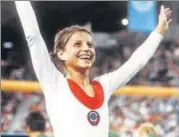  ?? AP ?? In this August 1972 file photo, Russia’s Olga Korbut celebrates after winning the individual women's gymnastics gold.