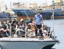  ?? Reuters ?? Migrants arrive at a naval base after being rescued by Libyan coastguard crew in Tripoli, Libya, on Friday