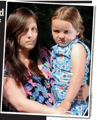  ??  ?? F Frozen out t of fh her l local l school: h l Olivia, four, with her mum Melissa