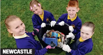  ?? ?? Prize haul: Young eco warriors from Westerhope Primary School work together