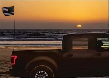  ?? Photograph­s by Myung J. Chun Los Angeles Times ?? OCEANO DUNES State Vehicular Recreation Area is the only California state park where vehicles are allowed on the beach. That could change after a Coastal Commission meeting today on the area’s fate.