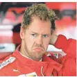  ?? FOTO: DPA ?? Ferrari-Pilot Sebastian Vettel vor einer Trainingse­inheit.