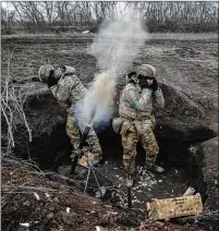  ?? ?? Soldiers with the 71st Separate Hunting Brigade of the Air Assault Forces fire a mortar at a Russian target in Chasiv Yar, Ukraine, on Wednesday. The U.S. and Britain are set to ship artillery and rockets for a coming offensive.