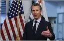  ?? RICH PEDRONCELL­I — THE ASSOCIATED PRESS ?? Gov. Gavin Newsom faces the certainty of whacking California government services while raising taxes.