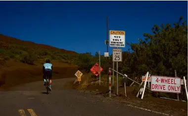  ??  ?? Left, above and opposite page: After more than 80km of climbing, things only get tougher when Mauna Kea throws in a 7.5km section of fine, loose gravel, including stretches at 20% gradient. Many riders switch to a mountain bike at this point