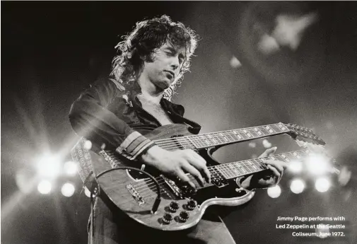  ?? ?? Jimmy Page performs with Led Zeppelin at the Seattle Coliseum, June 1972.