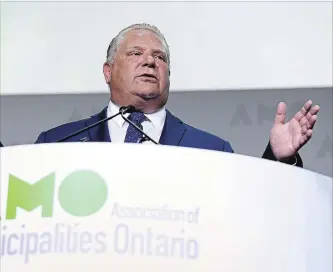  ?? JUSTIN TANG THE CANADIAN PRESS ?? Ontario Premier Doug Ford speaks at the Associatio­n of Municipali­ties of Ontario in Ottawa on Monday.