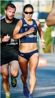  ??  ?? LEFT Lanni Marchant at the Vancouver Eastside 10K