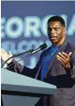  ?? SEAN RAYFORD / GETTY IMAGES / TNS ?? Herschel Walker, the football legend who is now a Senate candidate, at a 2021 rally featuring former President Donald Trump in Perry, Georgia.