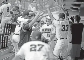  ?? SARAH PHIPPS/THE OKLAHOMAN ?? OSU’s Nolan McLean (13) celebrates a home run during a NCAA Stillwater Regional baseball game against Missouri State at O’Brate Stadium in Stillwater on June 3.