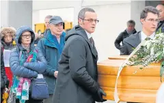  ??  ?? STILL NO ANSWERS: The family of Giulio Regeni follows his coffin during the funeral service in Fiumicello, Northern Italy. Regeni’s body was found dumped outside Cairo.