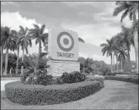  ?? AP/WILFREDO LEE ?? The entrance for
a Target store in North Miami Beach, Fla., is seen in this Wednesday photo. Target shares closed at $55.04, up nearly 1 percent in New York trading Wednesday, but they’re still down more than 24 percent for the year.