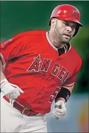  ?? Alex Gallardo EPA / Shuttersto­ck By Jeff Miller ?? ALBERT PUJOLS hit two home runs to run his career total to 630, tied for sixth on the all-time list.