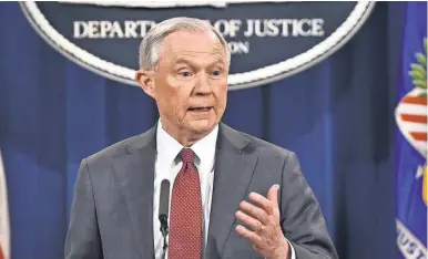  ?? NICHOLAS KAMM, AFP/ GETTY IMAGES ?? Attorney General Jeff Sessions announces Thursday that he will recuse himself from any investigat­ions into President Trump’s 2016 election campaign.