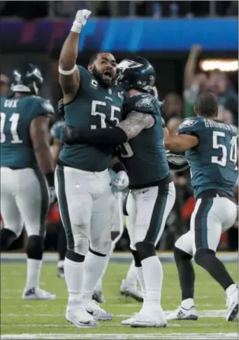  ?? CHRIS O’MERA — THE ASSOCIATED PRESS ?? Eagles defensive end Brandon Graham (55) celebrates after causing a fumble by New England Patriots quarterbac­k Tom Brady during the fourth quarter of the Super Bowl.