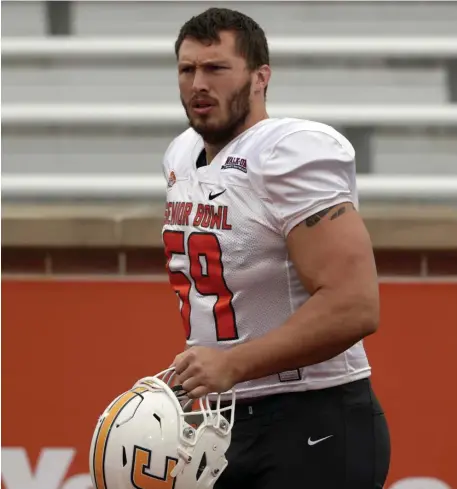  ?? Ap File ?? THEIR MAN: The Patriots selected Chattanoog­a offensive lineman Cole Strange with the 29th pick last night.