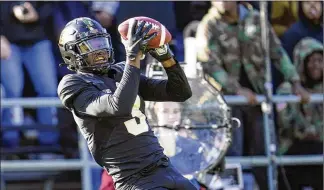  ?? ASSOCIATED PRESS ?? Purdue receiver David Bell catches a TD pass against Michigan State last season. The Browns drafted Bell in the third round despite less-than-stellar 40-yard dash times. They like his hands.