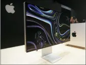  ?? JEFF CHIU — THE ASSOCIATED PRESS FILE ?? In this file photo a monitor of the Mac Pro is shown in the display room at the Apple Worldwide Developers Conference in San Jose, Calif.