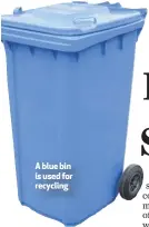  ??  ?? A blue bin is used for recycling