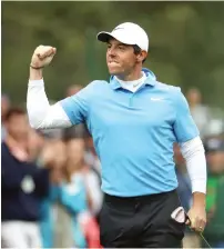  ?? AFP ?? Rory McIlroy pushed himself within three shots of the lead and into the final group with Patrick Reed. —