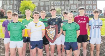  ?? ?? AROUND THE GROUNDS CHAMPION - Kyle Wallace retained his title as ‘Around the Grounds Champion 2022’ at St Colman’s College with a blistering personal best of 32:84 seconds. He is surrounded by the nine other finalists.