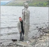  ??  ?? A SHORE THING: Rob Mulholland with sculpture Still.