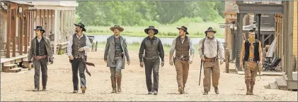  ?? SAM EMERSON/SONY PICTURES VIA AP ?? In this image released by Sony Pictures, (from left) Byung-hun Lee, Manuel Garcia-Rulfo, Ethan Hawke, Denzel Washington, Chris Pratt, Vincent D’Onofrio and Martin Sensmeier appear in a scene from “The Magnificen­t Seven.”