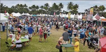 ?? CONTRIBUTE­D BY LEONARD BRYANT PHOTOGRAPH­Y 2016 ?? The 2018 Jupiter Seafood Festival will be held Saturday and Sunday at Carlin Park in Jupiter.