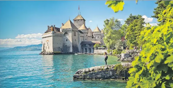  ?? PHOTOS: DOMINIC ARIZONA BONUCCELLI ?? Find the dank prison and battle-scarred weapons at Chateau de Chillon before strolling the ramparts for a tingly view of Lake Geneva.