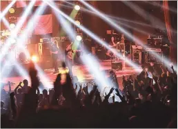  ?? AMIRUL SYAFIQ MOHD DIN/ THESUN ?? (left) Dream Theatre ... getting the crowd all worked up over its music.
(clockwise, from below centre) La Brie (left) with Petrucchi; Rudess; Mangini; and Myung.