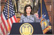  ?? HANS PENNINK/ASSOCIATED PRESS FILE PHOTO ?? New York Gov. Kathy Hochul speaks to reporters on July 1 about legislatio­n passed during a special session at the state Capitol in Albany, N.Y. As President Joe Biden runs up against what he can do, some governors in his party want more fire and boldness.