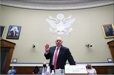  ?? TOM BRENNER/POOL VIA AP ?? Postmaster General Louis DeJoy is sworn in before testifying before a House Oversight and Reform Committee hearing on the Postal Service on Capitol Hill Aug. 24 in Washington.
