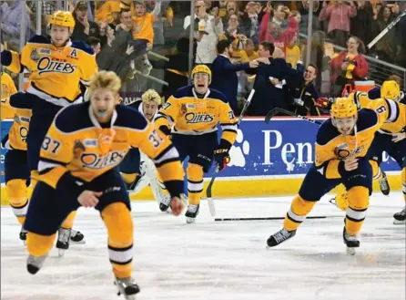  ?? DAN HICKLING, OHL IMAGES ?? The Erie Otters celebrate their Ontario Hockey League title over the Mississaug­a Steelheads last May. Don’t expect a repeat performanc­e.