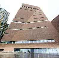  ??  ?? This Tuesday, June 14, 2016 le photo shows an exterior view of a new building called Switch House that has been added on to the Tate Modern gallery in London.