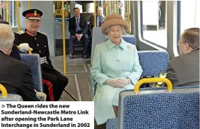  ?? ?? > The Queen rides the new Sunderland-Newcastle Metro Link after opening the Park Lane Interchang­e in Sunderland in 2002