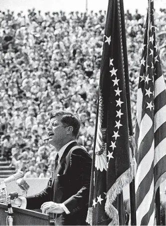  ?? Staff file photo ?? President John F. Kennedy addresses a crowd at Rice University Stadium in September 1962.