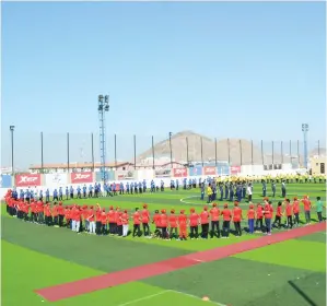  ??  ?? Participan­ts perform a drill at the sports meet.