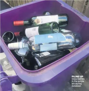  ??  ?? PILING UP Glass bottles in the purple bin during lockdown