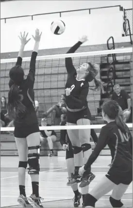  ??  ?? LaFayette's Gracie Stier (right) looks on as teammate Karissa Tatum attempts to block a shot by Ridgeland's Te'a Owens during last Thursday's opener at Ridgeland. The Lady Panthers won the match in two sets before extending their winning streak to six...