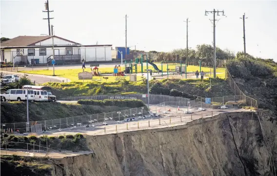  ?? Photos by Noah Berger / Special to The Chronicle ?? Daly City is the most populous of the high-risk sites identified in the new study, as evidenced by the bluffs adjacent to Christ Central Presbyteri­an Church.