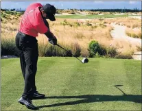  ?? AP PHOTO ?? Tiger Woods tees off from the 14th hole during the final round of the Hero World Challenge golf tournament at Albany Golf Club in Nassau, Bahamas, on Sunday.