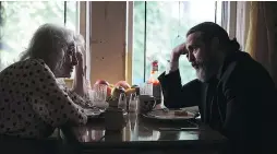  ??  ?? Judith Roberts, left, and Joaquin Phoenix in You Were Never Really Here, a film with a violent plot and interior point of view that pushes the audience away at every turn.
