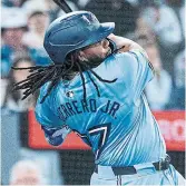  ?? NICK LACHANCE TORONTO STAR ?? The Blue Jays’ Vladimir Guerrero Jr. hits his fourth single against the Twins on Sunday. It was his first game of the season with three or more hits.