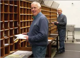  ??  ?? Postmen John Whelan and Paul Cashin at the New Ross An Post depot.