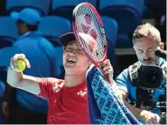  ?? TONY ASHBY/AFP ?? WAKIL ASIA: Yoshihito Nishioka merayakan kemenangan atas Nikoloz Basilashvi­li pada laga kedua ATP Cup di Perth, Australia, kemarin.