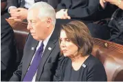  ?? J. SCOTT APPLEWHITE/ASSOCIATED PRESS ?? House Minority Leader Nancy Pelosi of California and Minority Whip Steny Hoyer, D-Md., listen to the State of the Union address Tuesday night.